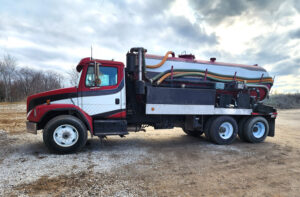 West central Illinois septic pumping service truck owned by Hollister, available for service and emergencies.